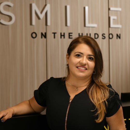 Carolina T. of Smiles on the Hudson dental practice in Edgewater, New Jersey