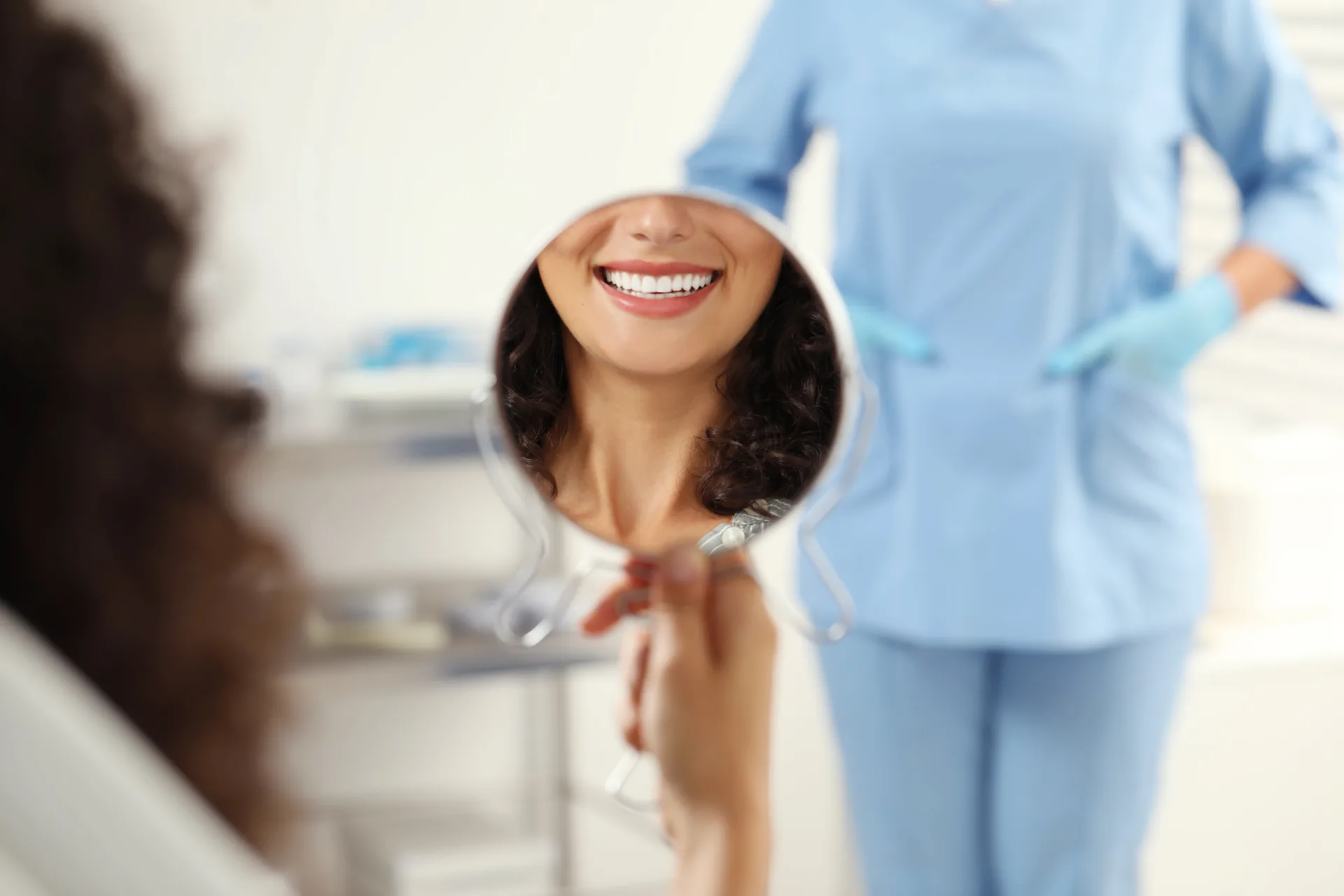 Patient consulting with an oral surgeon about facial trauma reconstruction.