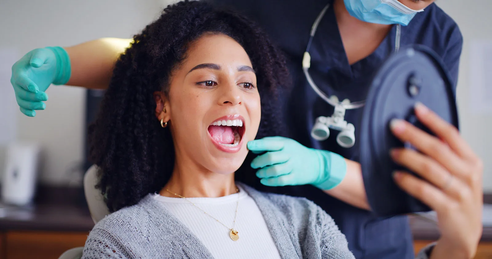 Person reading dental health information.